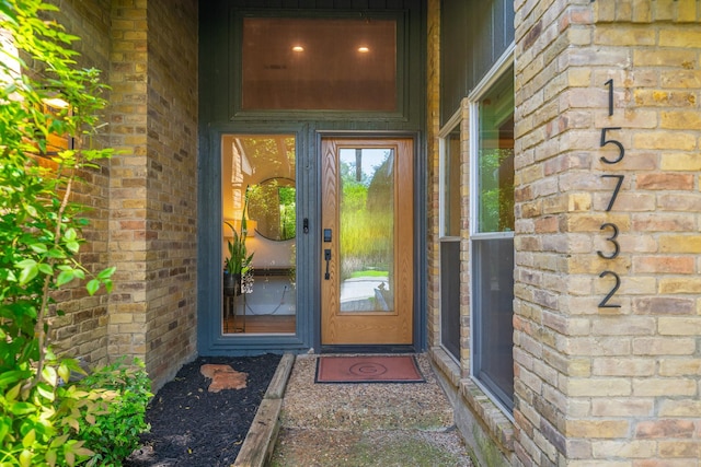 15732 Nedra Way, Dallas, TX 75248 - view of exterior entry featuring brick siding
