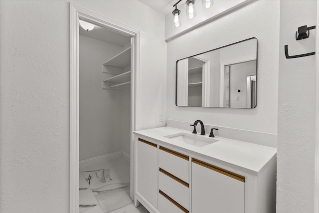 11230 Cotillion Dr, Dallas, TX 75228 - bathroom featuring marble finish floors and vanity