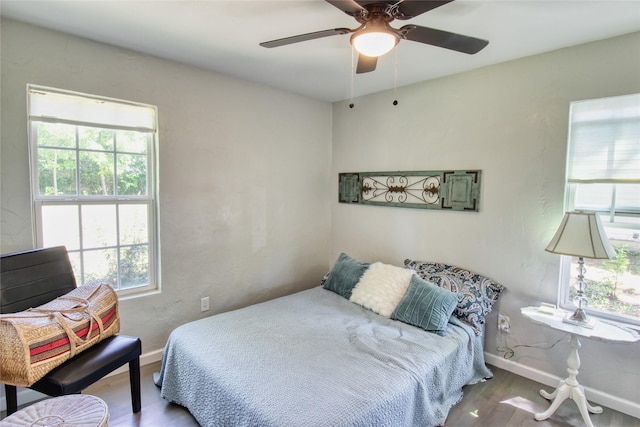 505 E 4th St, Weatherford, TX 76086 - bedroom featuring wood finished floors and a ceiling fan