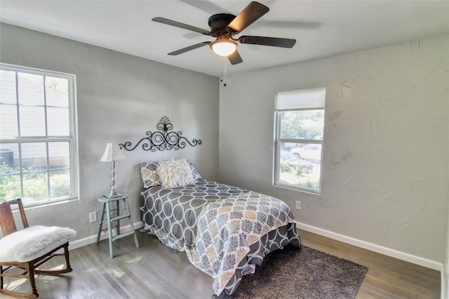 505 E 4th St, Weatherford, TX 76086 - bedroom featuring wood finished floors and ceiling fan