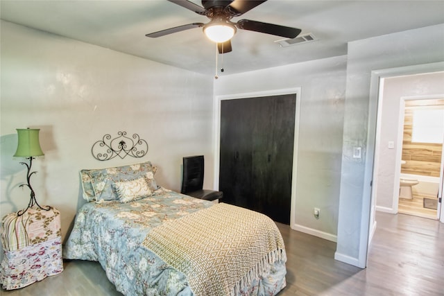 505 E 4th St, Weatherford, TX 76086 - bedroom featuring wood finished floors, a closet, and a ceiling fan