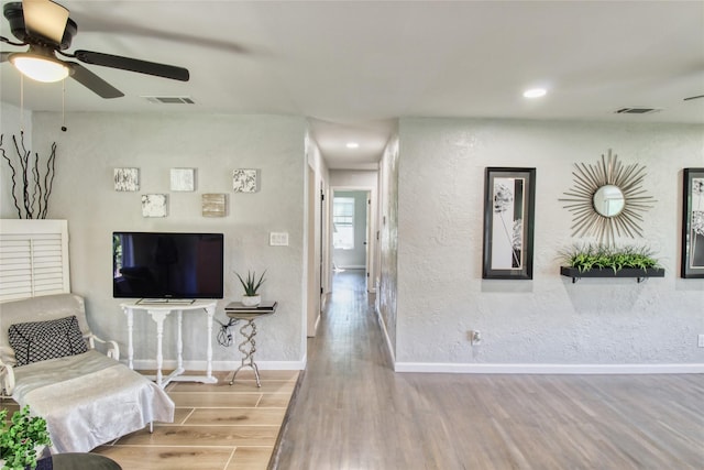 505 E 4th St, Weatherford, TX 76086 - living room featuring wood finished floors, a ceiling fan, and recessed lighting