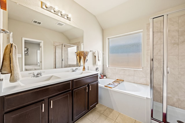 3010 Rosemount Ln, Forney, TX 75126 - bathroom with lofted ceiling, ensuite bath, a stall shower, tile patterned floors, and a garden tub