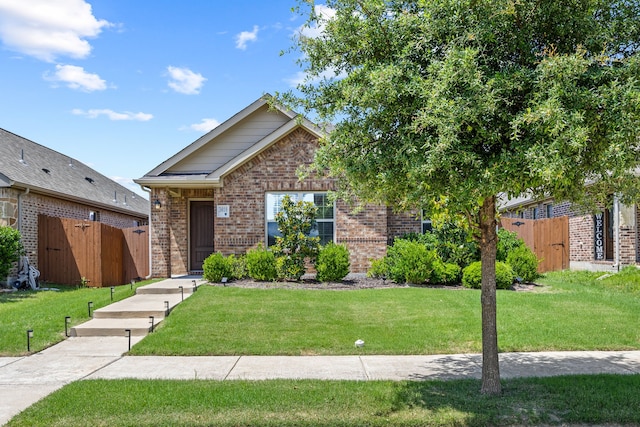 3010 Rosemount Ln, Forney, TX 75126 - view of front of house with brick siding and a gate