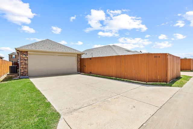 3010 Rosemount Ln, Forney, TX 75126 - view of property exterior featuring a garage, fence, central air condition unit, and brick siding
