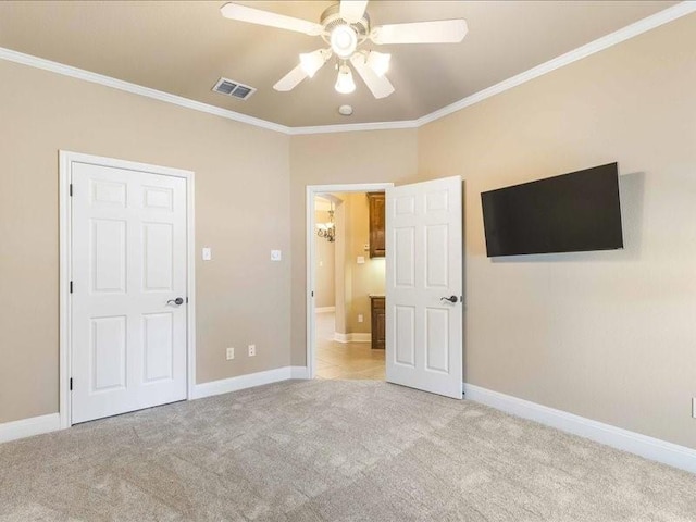 113 Winding Creek Ln, Waco, TX 76657 - unfurnished bedroom with ornamental molding, carpet flooring, baseboards, and ceiling fan