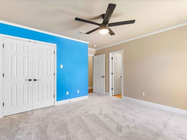 113 Winding Creek Ln, Waco, TX 76657 - unfurnished bedroom with ornamental molding, baseboards, carpet flooring, a closet, and ceiling fan