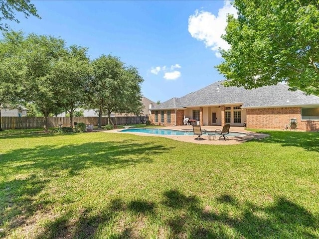113 Winding Creek Ln, Waco, TX 76657 - back of house featuring brick siding and a patio