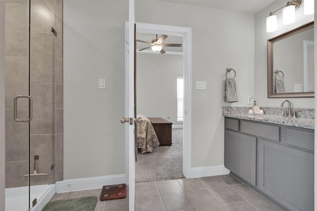 2113 Ajay Dr, Sherman, TX 75092 - ensuite bathroom with a shower stall, baseboards, a ceiling fan, and vanity