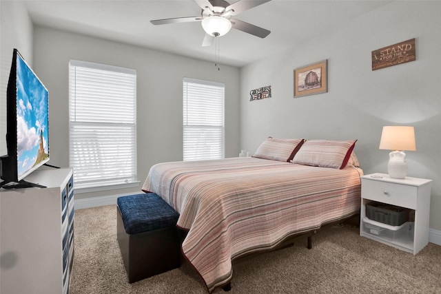 2113 Ajay Dr, Sherman, TX 75092 - carpeted bedroom with baseboards and a ceiling fan