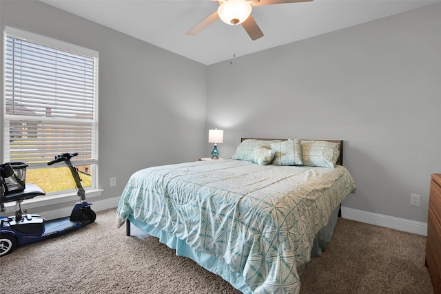 2113 Ajay Dr, Sherman, TX 75092 - carpeted bedroom featuring baseboards and a ceiling fan