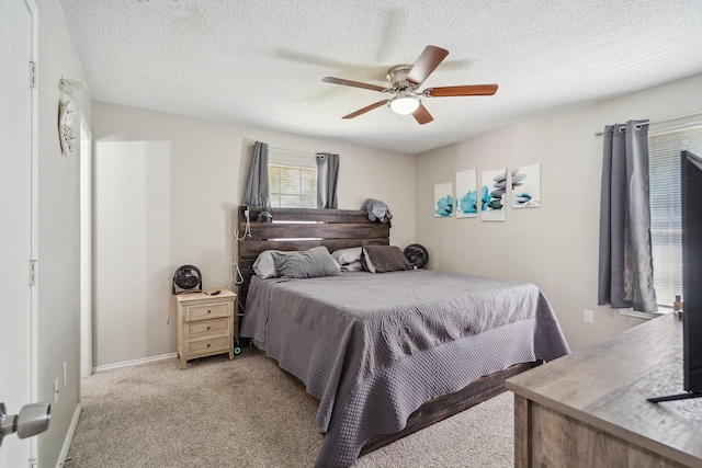 816 Red Oak Ct, Azle, TX 76020 - bedroom featuring light carpet, a textured ceiling, and ceiling fan