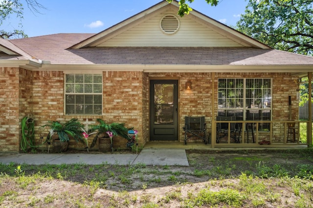 816 Red Oak Ct, Azle, TX 76020 - view of front facade with brick siding and a shingled roof