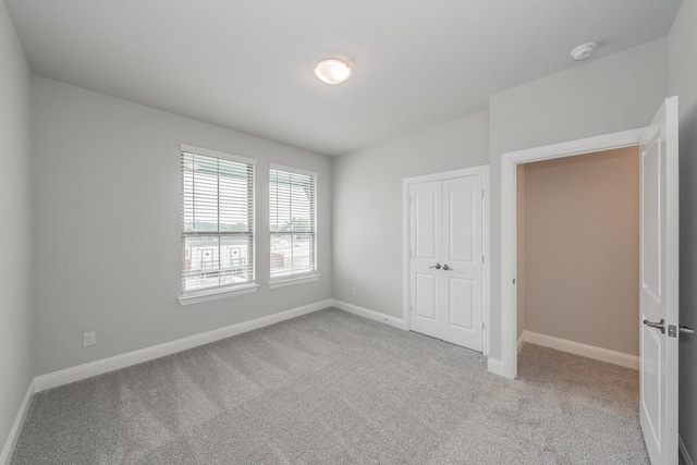 9553 Thorncrown Ln, Fort Worth, TX 76179 - unfurnished bedroom with carpet flooring, baseboards, and a closet