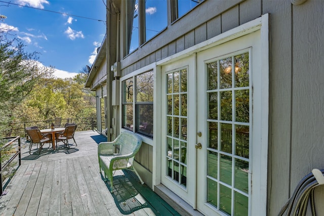 1867 Chaparral Dr, Gainesville, TX 76240 - wooden deck featuring outdoor dining space