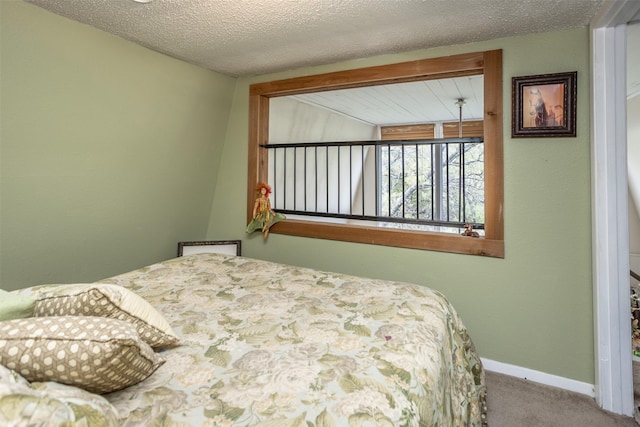 1867 Chaparral Dr, Gainesville, TX 76240 - bedroom featuring carpet and baseboards