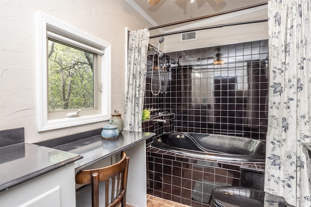 1867 Chaparral Dr, Gainesville, TX 76240 - full bath featuring ornamental molding, tiled shower / bath, and vanity