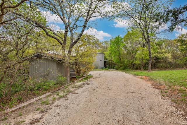 1867 Chaparral Dr, Gainesville, TX 76240 - view of dirt / gravel road