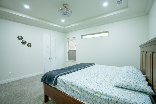 4569 Wilbarger St, Plano, TX 75024 - carpeted bedroom with a tray ceiling, recessed lighting, and baseboards