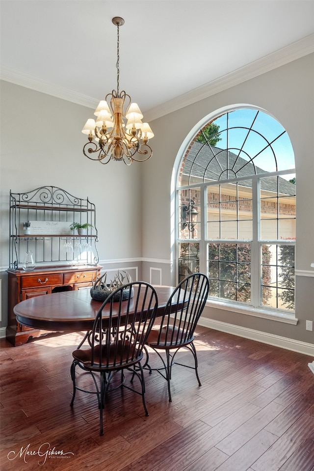 2228 Grapevine Ln, Haughton, LA 71037 - dining room featuring a chandelier, dark wood-style floors, crown molding, and baseboards