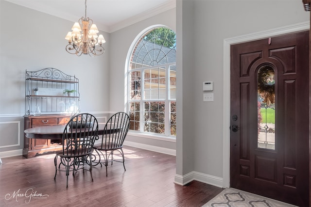 2228 Grapevine Ln, Haughton, LA 71037 - dining room with a chandelier, dark wood-style flooring, crown molding, and baseboards