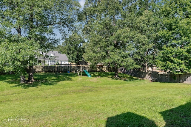 2228 Grapevine Ln, Haughton, LA 71037 - view of yard with a playground and view of scattered trees