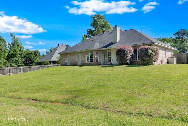 2228 Grapevine Ln, Haughton, LA 71037 - back of house featuring brick siding and a chimney