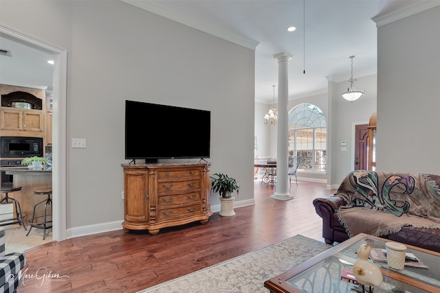 2228 Grapevine Ln, Haughton, LA 71037 - living room featuring ornamental molding, wood finished floors, baseboards, recessed lighting, and ornate columns