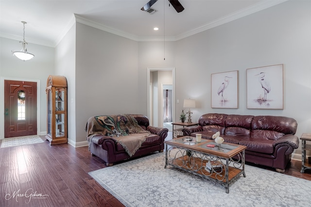 2228 Grapevine Ln, Haughton, LA 71037 - living area featuring wood finished floors, a high ceiling, ceiling fan, ornamental molding, and baseboards