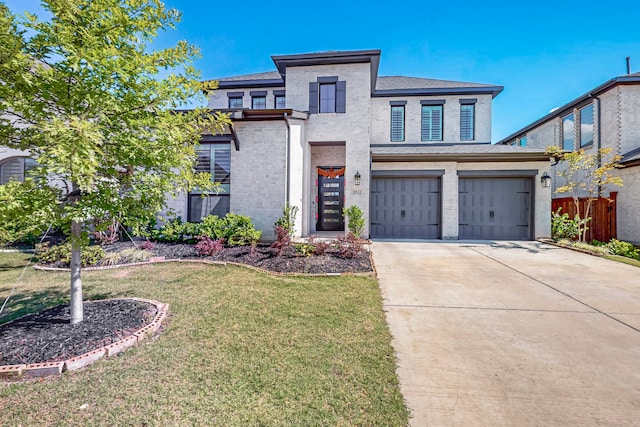 3932 Linear, Celina, TX 75078 - view of front of home featuring driveway, a garage, stucco siding, brick siding, and roof with shingles
