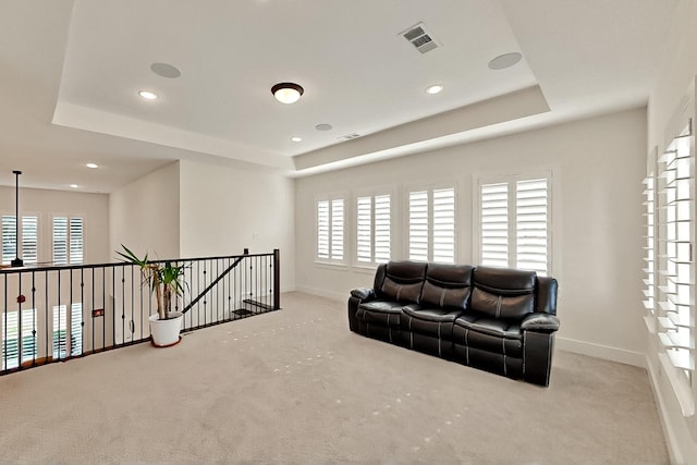3932 Linear, Celina, TX 75078 - living area featuring carpet, a tray ceiling, plenty of natural light, baseboards, and recessed lighting