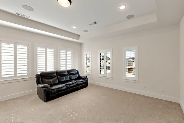 3932 Linear, Celina, TX 75078 - carpeted living room with baseboards, a raised ceiling, and recessed lighting