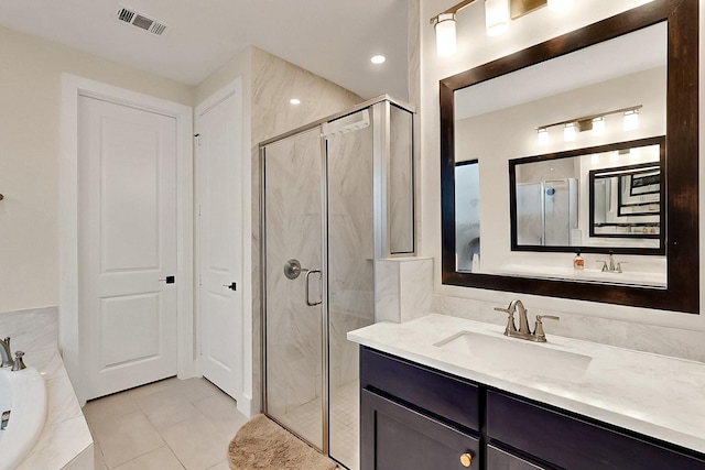 3932 Linear, Celina, TX 75078 - bathroom featuring a shower stall, a bath, vanity, and tile patterned floors