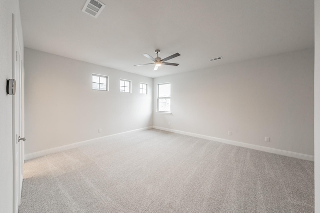 9709 Thorncrown Ln, Fort Worth, TX 76179 - spare room featuring a ceiling fan, light carpet, and baseboards