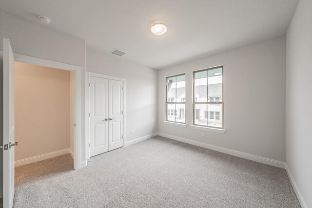 9709 Thorncrown Ln, Fort Worth, TX 76179 - unfurnished bedroom with carpet flooring, baseboards, and a closet