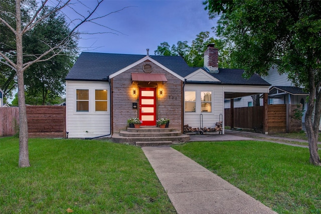 1300 Mountain Lake Rd, Dallas, TX 75224 - view of front of property featuring a chimney, roof with shingles, and a carport