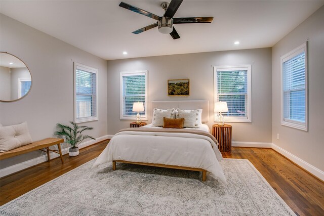 1300 Mountain Lake Rd, Dallas, TX 75224 - bedroom with baseboards, wood finished floors, recessed lighting, and ceiling fan