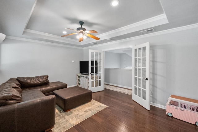 1304 Brook Arbor Dr, Mansfield, TX 76063 - living area with french doors, a raised ceiling, wood finished floors, ceiling fan, and baseboards