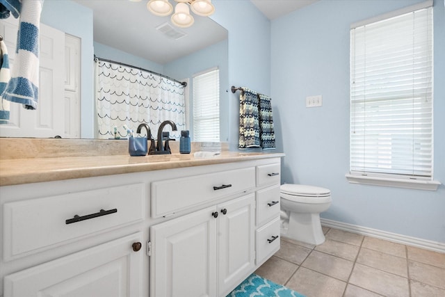1304 Brook Arbor Dr, Mansfield, TX 76063 - bathroom featuring baseboards, tile patterned flooring, vanity, and toilet
