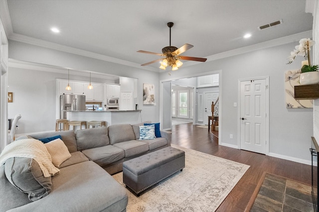 1304 Brook Arbor Dr, Mansfield, TX 76063 - living area featuring a ceiling fan, dark wood-type flooring, baseboards, crown molding, and recessed lighting