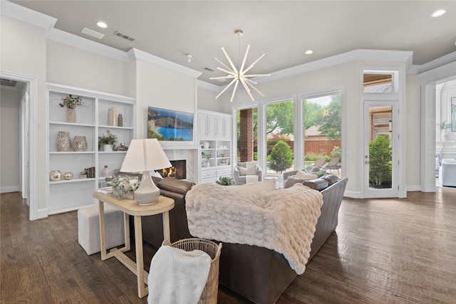 5916 Orchard Park Dr, Frisco, TX 75034 - living area with crown molding, a high end fireplace, dark wood-type flooring, recessed lighting, and baseboards