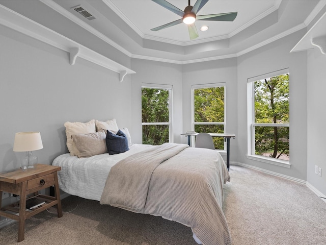 5916 Orchard Park Dr, Frisco, TX 75034 - bedroom with carpet flooring, ornamental molding, multiple windows, a tray ceiling, and baseboards