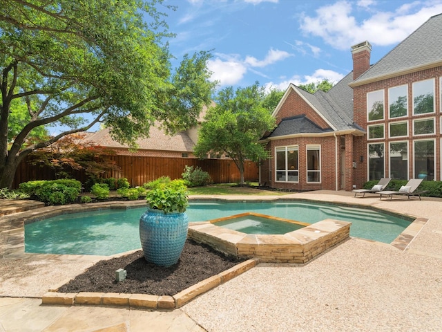 5916 Orchard Park Dr, Frisco, TX 75034 - view of pool featuring a fenced backyard, a patio area, and a pool with connected hot tub