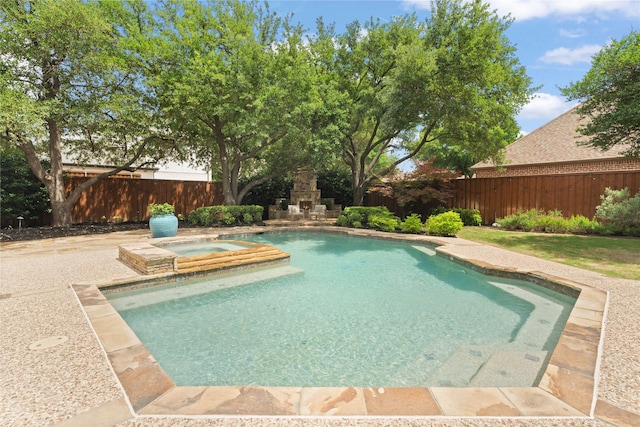 5916 Orchard Park Dr, Frisco, TX 75034 - view of swimming pool with an outdoor stone fireplace, a fenced backyard, a patio area, and an in-ground hot tub