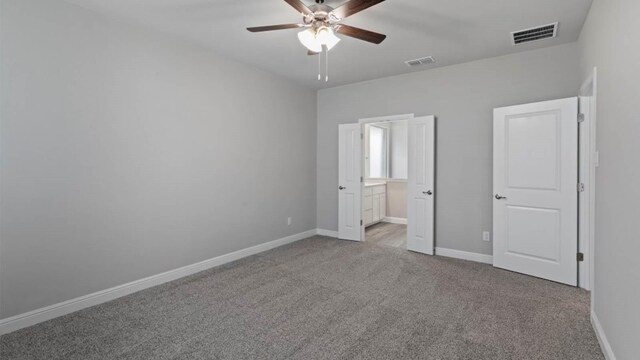 1913 Brindle St, Northlake, TX 76247 - unfurnished bedroom featuring carpet flooring, baseboards, ensuite bathroom, and a ceiling fan