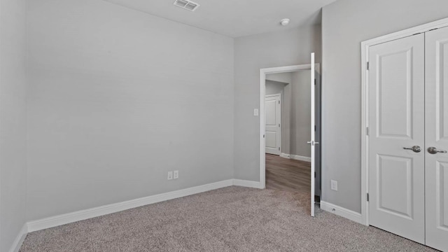 1913 Brindle St, Northlake, TX 76247 - unfurnished bedroom with light colored carpet, baseboards, and a closet