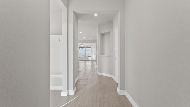 1900 Stetson St, Northlake, TX 76247 - hall with baseboards, wood finished floors, and recessed lighting