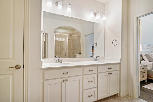 7132 Huckleberry Dr, Mckinney, TX 75070 - bathroom with a stall shower, ensuite bath, and double vanity