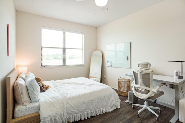 7132 Huckleberry Dr, Mckinney, TX 75070 - bedroom with dark wood-style floors, baseboards, and a ceiling fan
