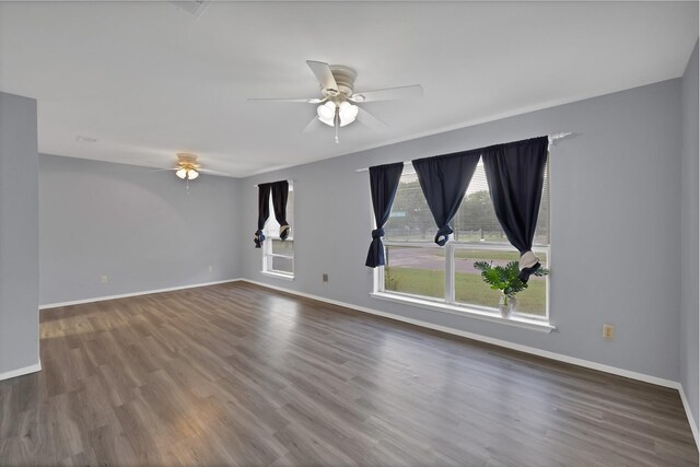 7357 Channel View Dr, Fort Worth, TX 76133 - empty room with a ceiling fan, baseboards, and wood finished floors